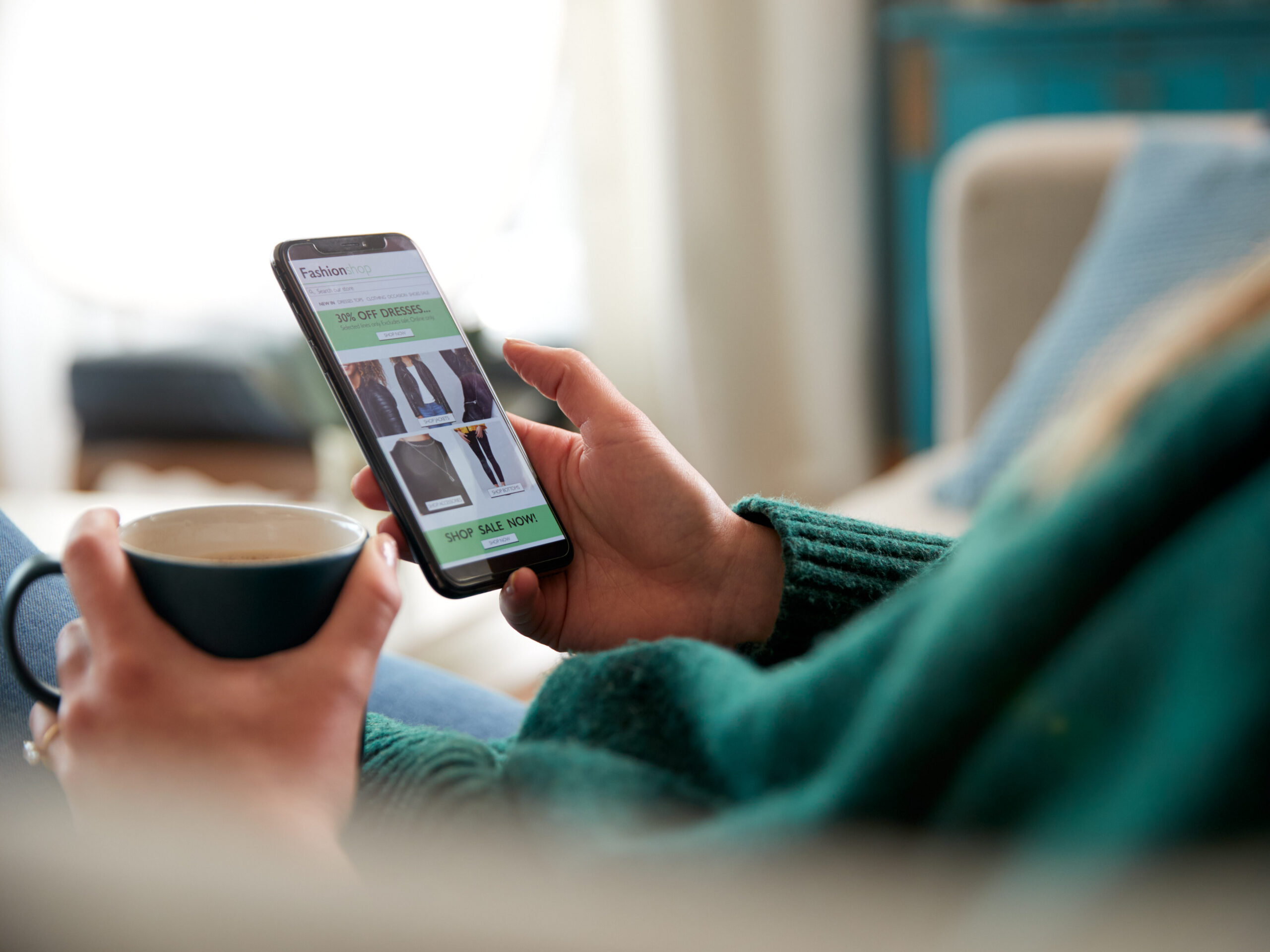 A person online shopping using their phone